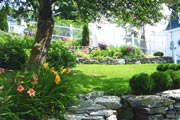 A garden of perennials and annuals in a custom landscape design. gardens and orchards