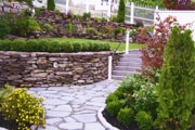 Native Maine granite and flagstones in a custom landscape design. stone work